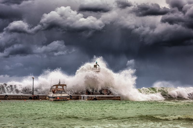 Boat facing stormy seas