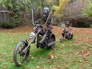 Metal skeleton figures on motorcycles