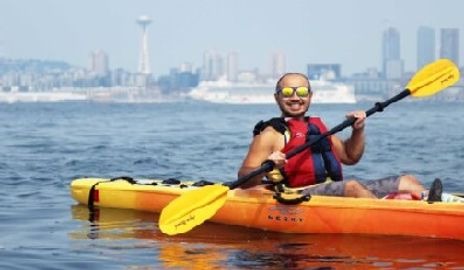 Man kayaking in Puget Sound